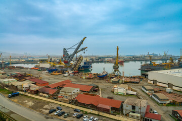 Fototapeta premium Wide image of the shipping dock at Baku with lots of warehouses around