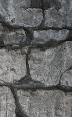 Masonry of large ancient stones detailed stock photo for vertical story 