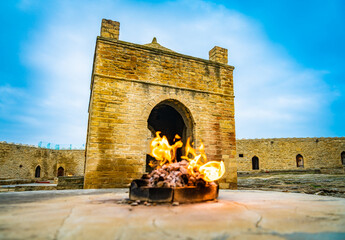 Atashgah Zoroastrian with the fire in the front out of focus and the background in  foxus