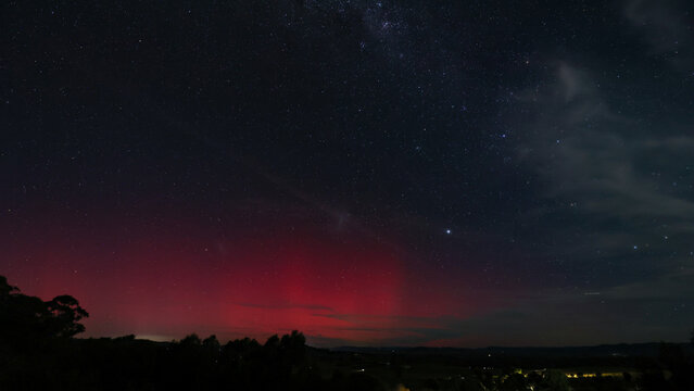 Rural Australian sky illuminated by Aurora Australis, wide angle