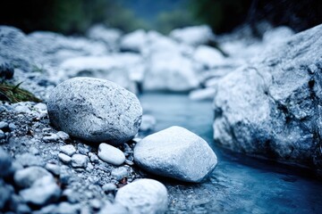 Gray stones and a clear stream in a mountain setting