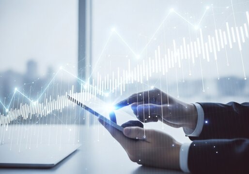 Man using tablet with digital stock chart overlay