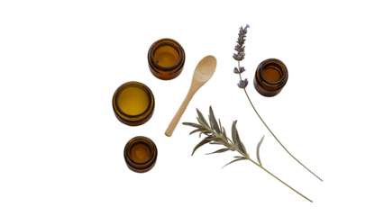Amber jars with yellow contents and wooden spoon with lavender sprigs image