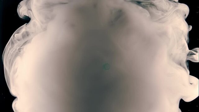 An air bubble filled with smoke explodes spectacularly, forming a beautiful cloud and waves. Closeup. Macro. Slow mo, slow motion, high speed camera, 200fps