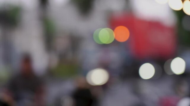 Bokeh of cars and traffic lights at night. Bokeh of City Night Traffic. Round colorful bokeh shine from car lights in traffic jam on city street.