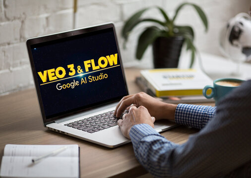Businessman working with google ai studio's veo 3 & flow on laptop