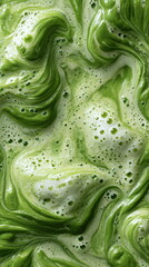 Vibrant Creamy Matcha Green Tea with Frothy Swirls