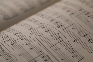 Obraz premium Sheets with musical notes as background, closeup