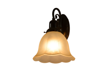 Illuminated wall sconce with frosted glass shade.