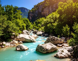 Turquoise river flowing through a lush valley