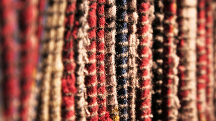 Closeup background of a carpet woven from cotton yarn