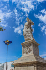 Historic Roman Statue Against Blue Sky