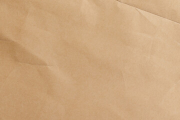 Crumpled old brown wrapping paper with recycled texture surface. Abstract background