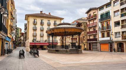 Fototapeta premium Square in the old town of the city of Zarauz with a kiosk of traditional music, Basque Country, Spain.