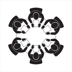 Six people sitting around a round table in a meeting view from above