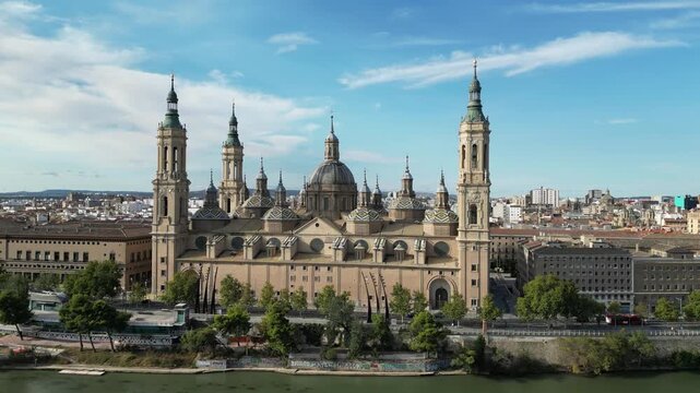 Aerial view of the grand Basilica of Our Lady of the Pillar, its towers rising majestically against the skyline, Zaragoza, Aragon, Spain.