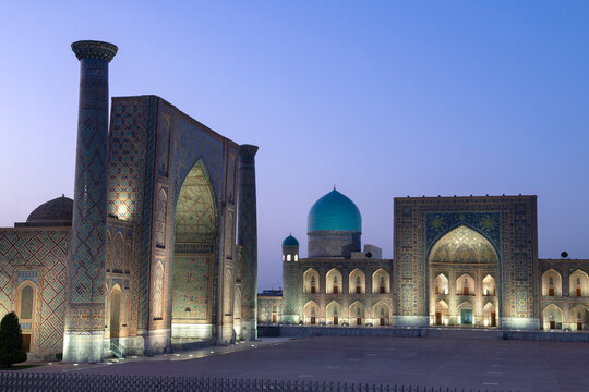 Two ancient mosques in night light. Registan square, Samarkand