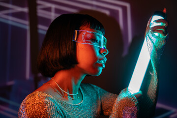 Latin woman engaging with futuristic virtual reality