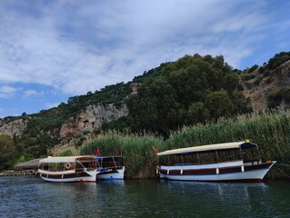 Naklejka premium Beautiful bright nature photo image of marina yacht club boat in the sea with blue sky ultra high quality resolution wallpaper banner poster 