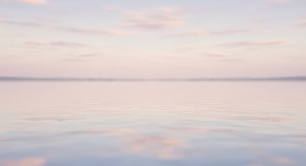 Fototapeta premium Serene Sunset Reflection on Calm Water: A Dreamy Pastel Landscape