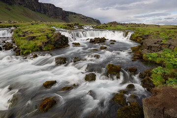 Scenic view of Fossalar waterfall in Iceland in summer time.