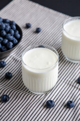 Organic Blueberry Kefir in a Glass, side view.