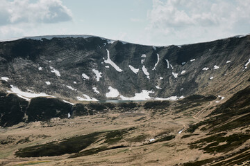 Snow-capped peaks and rugged terrain in Svydovets mountain range, Carpathians