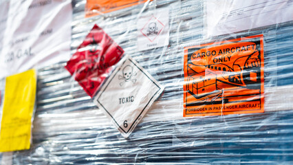 Toxic chemical with skull icon and flammable liquid sticker placard that installed on the hazard...