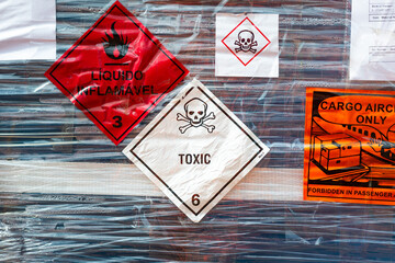 Toxic chemical with skull icon and flammable liquid sticker placard that installed on the hazard...
