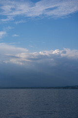 dark clouds pushing away the sunny weather, over Lake Constance seen from Höchst Vorarlberg