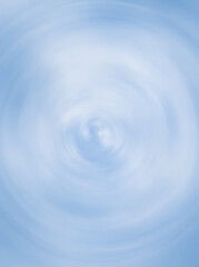  Soft blue circular swirl background with a smooth gradient and vortex-like motion. Ideal for modern, clean designs or abstract compositions with a calming effect.