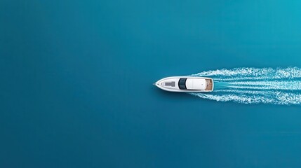Aerial view of speedboat leaving white trails in deep blue ocean, dynamic summer adventure
