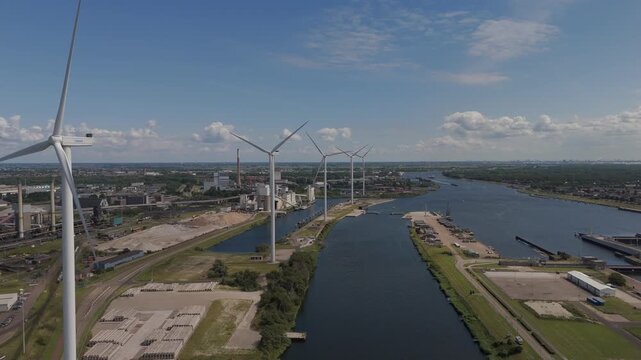 IJmuiden, Netherlands - July 29, 2025. Aerial View of Wind Turbines, Tata Steel Site and North Sea Canal near the IJmuiden Locks