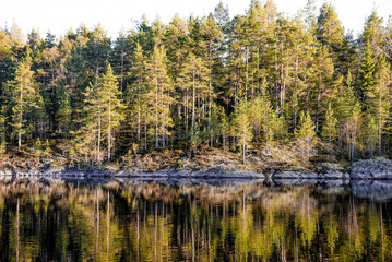 Landscape blue deep lake light sun, clouds sky mountains Ladoga skerries Karelia