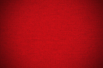 Dark red fabric cloth texture for background, natural textile pattern.