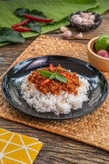 The Stir Fried Pork and Yard Long Bean with Curry Paste image for  Thai food concept.