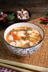 The Hot and Sour Chicken Soup or  Tom Yum Gai for Thai food and cooking concept  