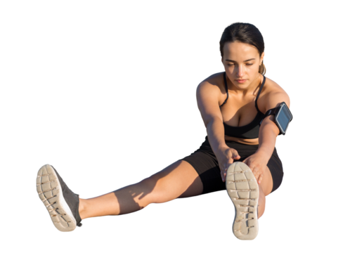 A young slim athletic girl in sportswear with snakeskin prints performs a set of exercises. Fitness and healthy lifestyle.
