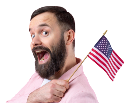 Portrait of a satisfied young man with a beard with an American flag on a red studio background. Great US patriot and defender of freedom.
