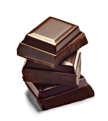 close up of chocolate pieces on white background