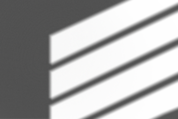 Abstract shadows on dark wall