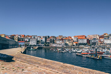 Fototapeta premium view of the old town sea port in norther spain with galician houses colorful 