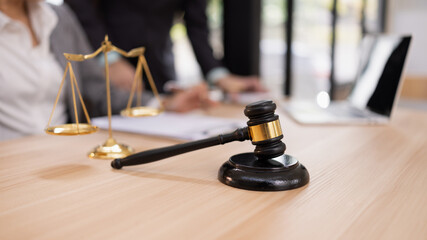 Lawyer with Document Paper and Hammer on Wood table,  Judge's Gavel, Law, Justice Symbol, Agreement...