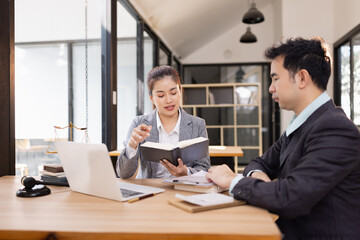 Lawyer with Document Paper and Hammer on Wood table,  Judge's Gavel, Law, Justice Symbol, Agreement and Partnership Concept,