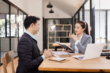 Lawyer with Document Paper and Hammer on Wood table,  Judge's Gavel, Law, Justice Symbol, Agreement and Partnership Concept,