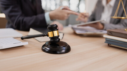 Lawyer with Document Paper and Hammer on Wood table,  Judge's Gavel, Law, Justice Symbol, Agreement...