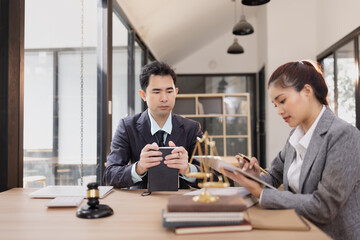  Lawyer with Document Paper and Hammer on Wood table,  Judge's Gavel, Law, Justice Symbol, Agreement and Partnership Concept,