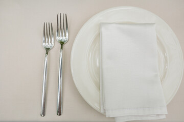 Empty plate with fork on old white table, Top view