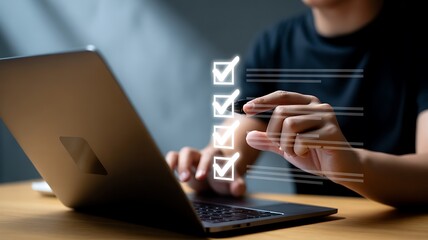 Person checking off items on a digital checklist on a laptop screen to-do list task management