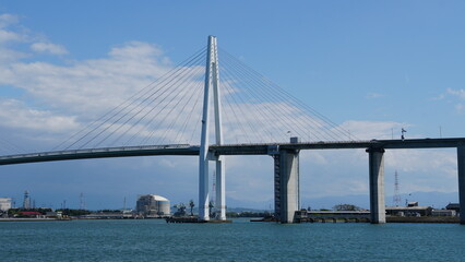 Toyama Port under Blue Skies: Bridges and Sails over the Japan Sea